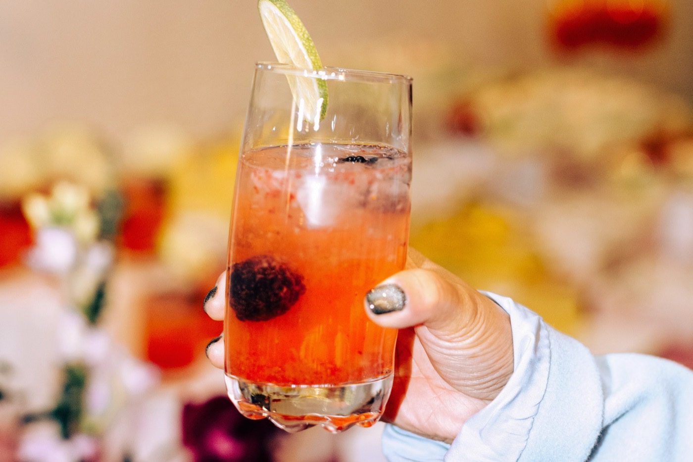 A handcrafted Club Citrine signature mocktail, garnished and styled on the bar